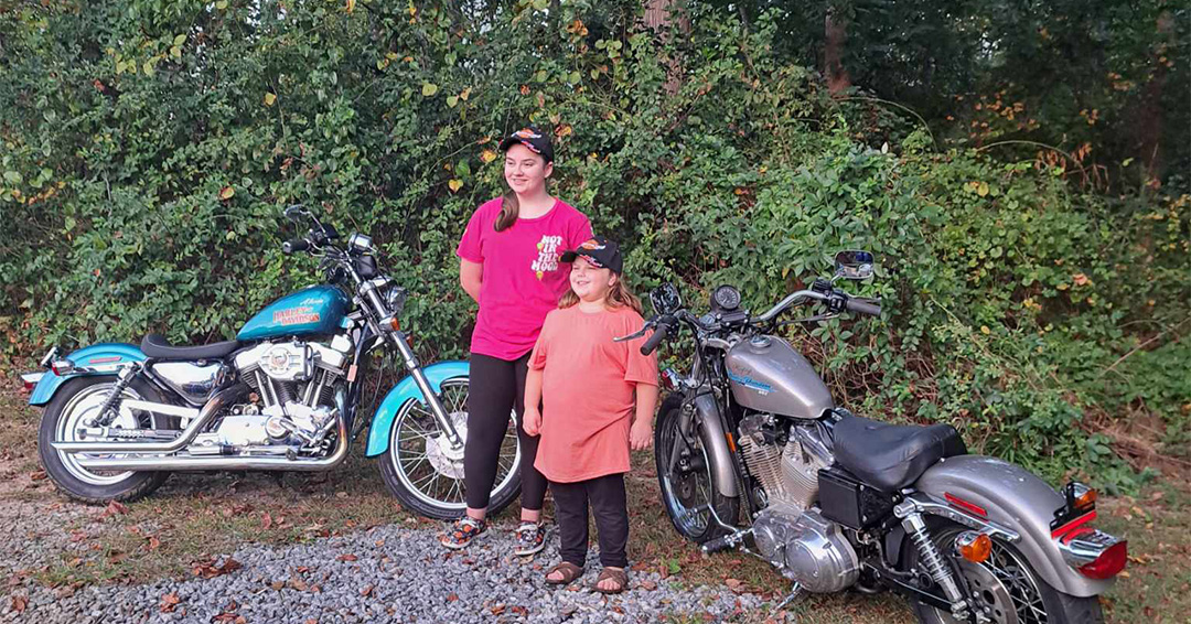 Alexis and Kayleigh with motorcycles