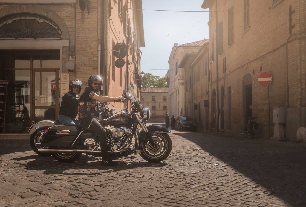 Two HOG riders on the picturesque streets of Senigallia