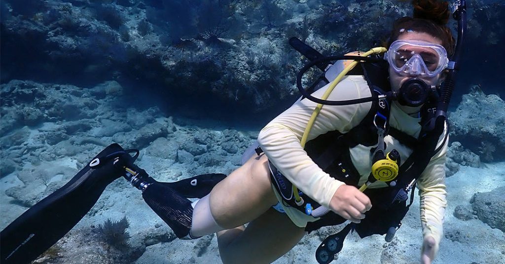 Isabel Marble scuba diving